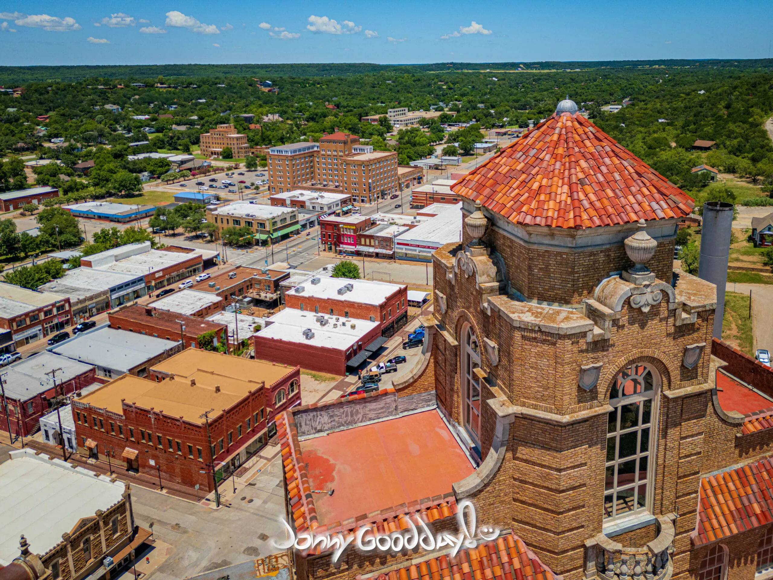 Aerial view across Mineral Wells with the Baker Hotel tower in the distance
