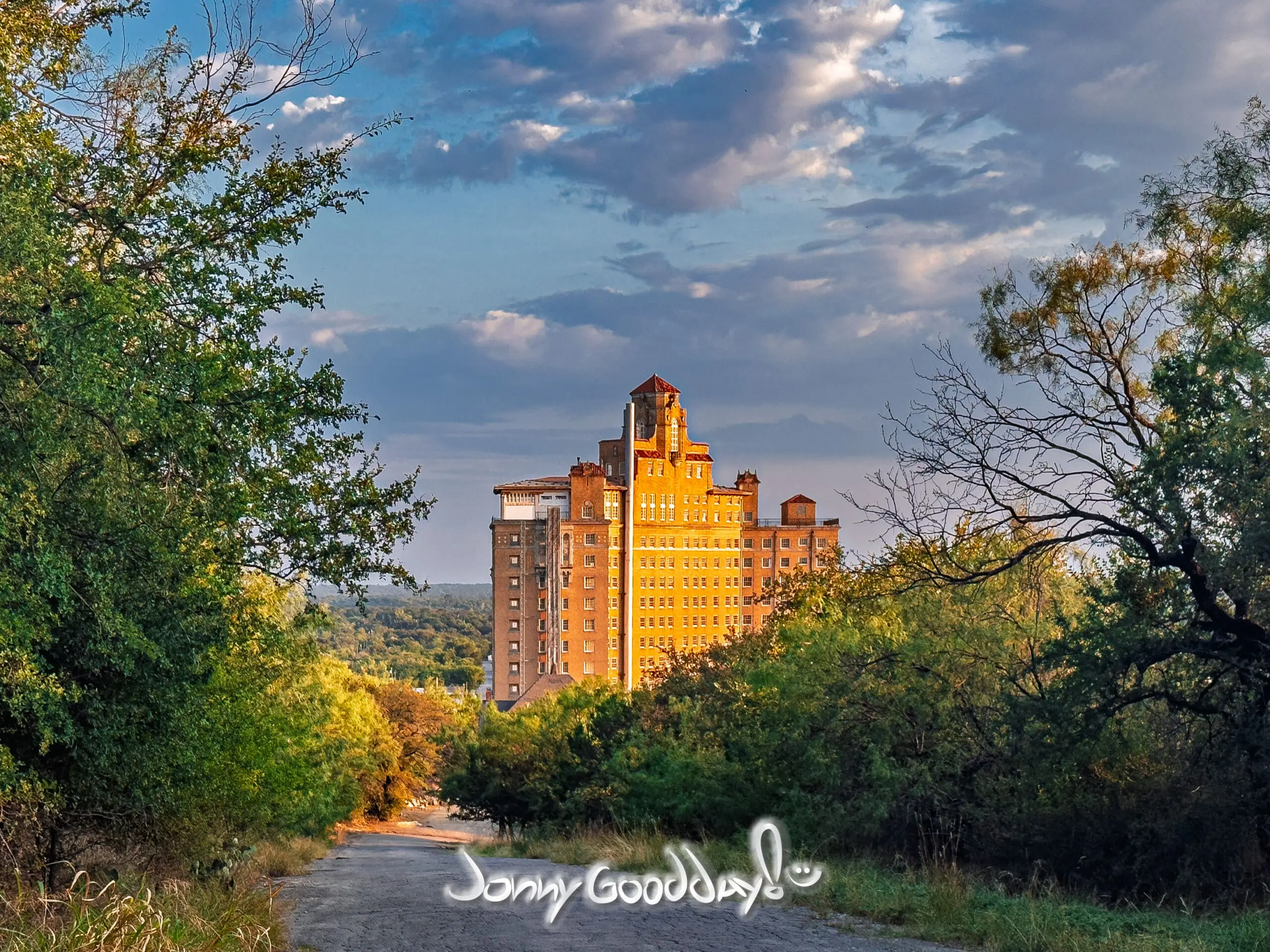 The Baker Hotel tower in Mineral Wells, Texas, glowing in golden-hour light