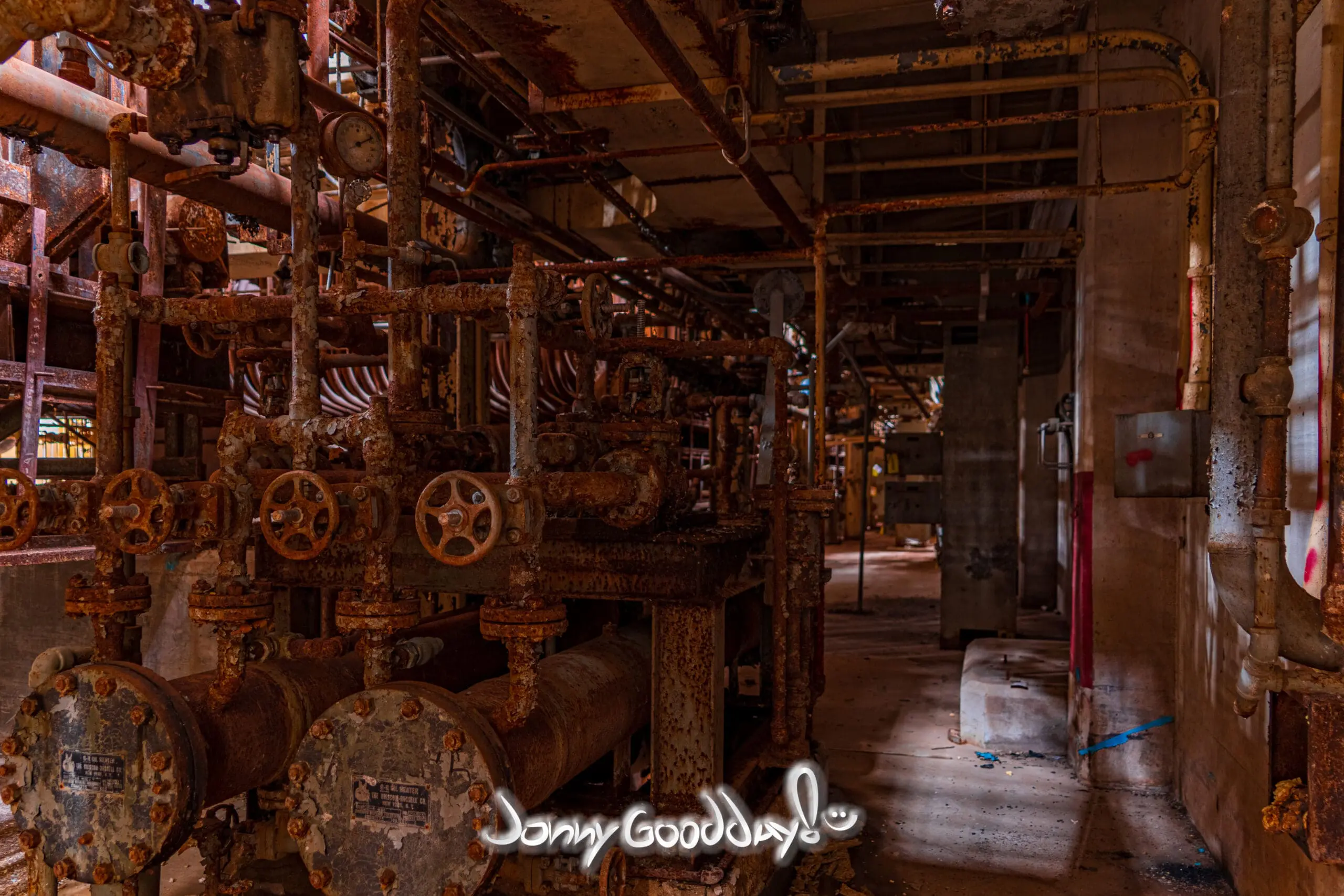 Rusting pipes valves and gauges inside the historic WTU Power Plant