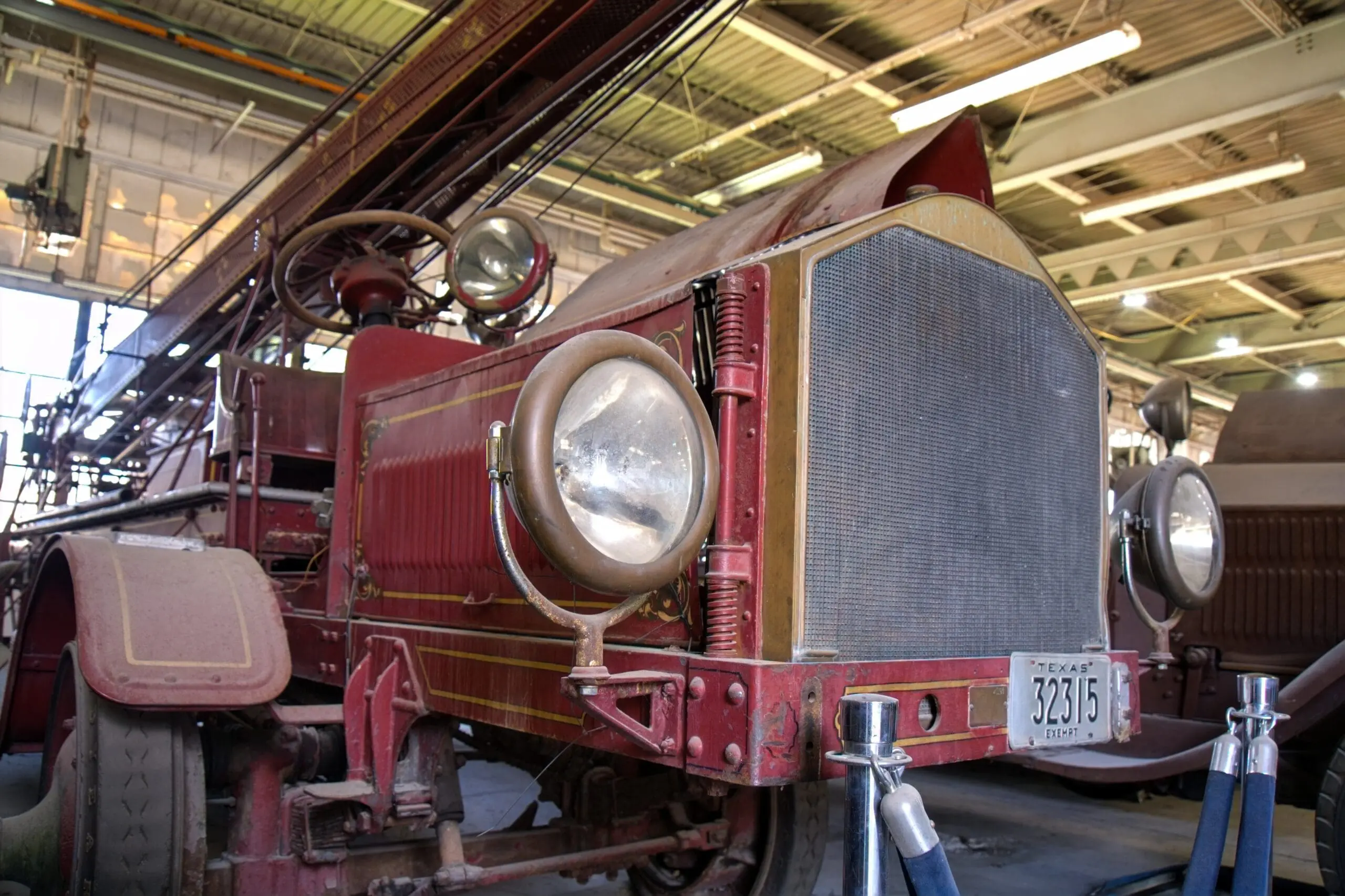 Restored antique fire engine inside the Texas Fire Museum in Dallas
