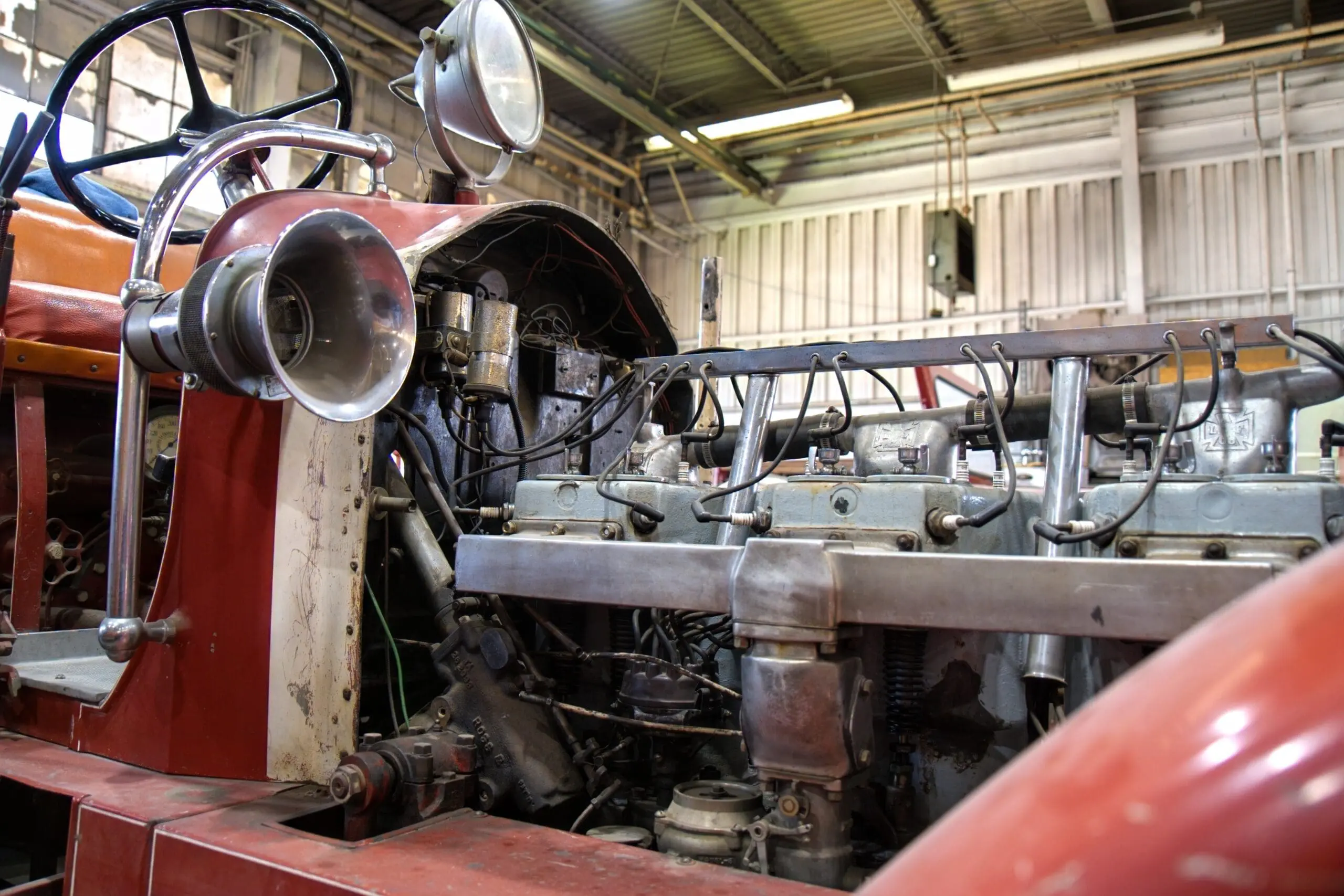 Partially restored antique fire apparatus in the Texas Fire Museum workshop