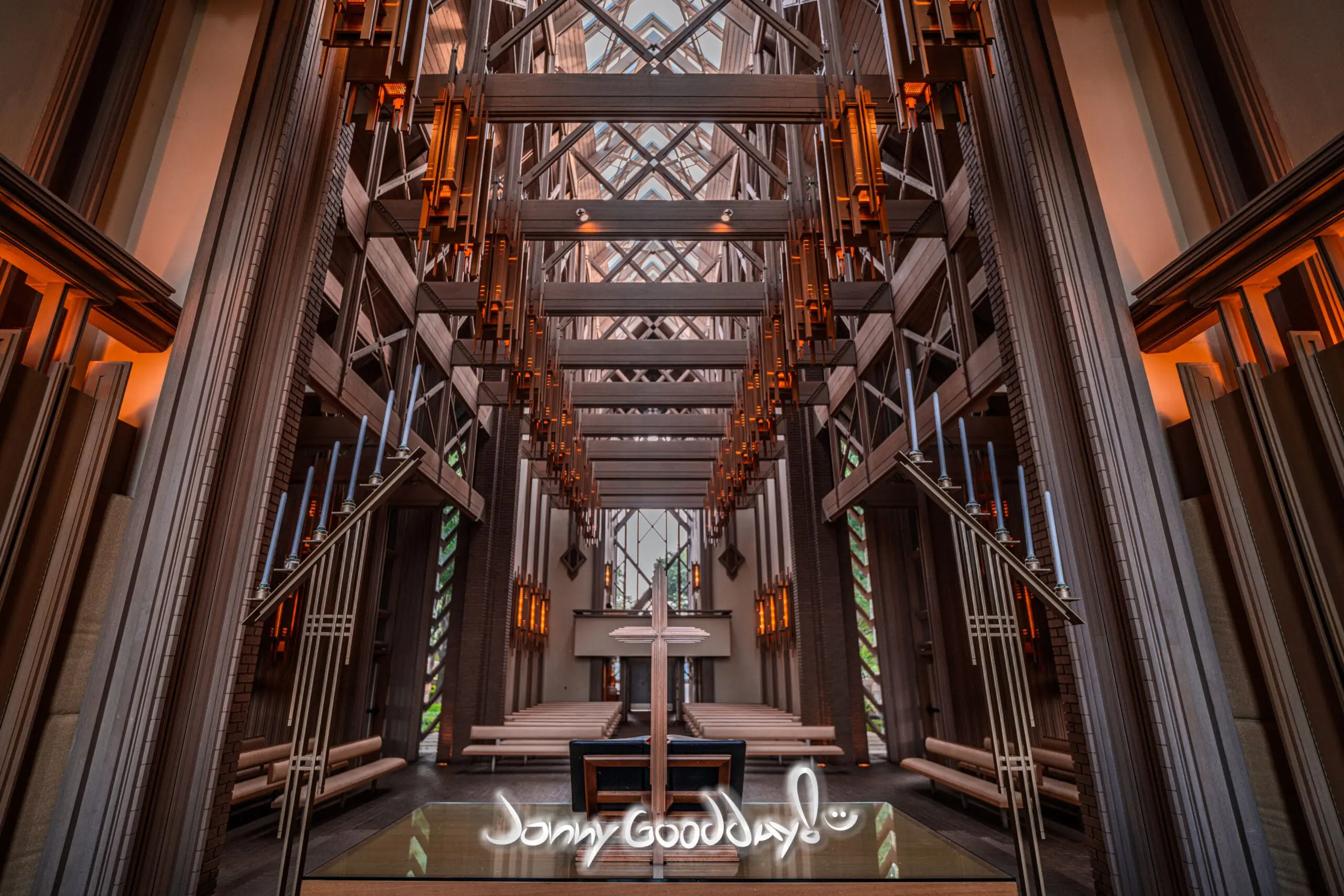 Cross and sanctuary interior beneath the timber vault of Marty Leonard Community Chapel in Fort Worth