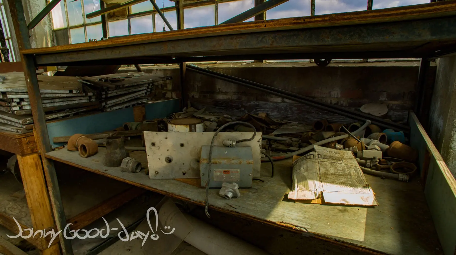 An old industrial workbench and mechanical equipment inside the Mineral Wells Box Factory.
