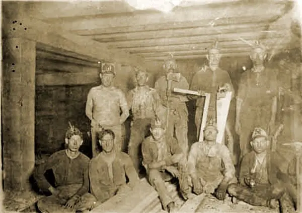 A historic photograph of a crew of Thurber coal miners working underground.