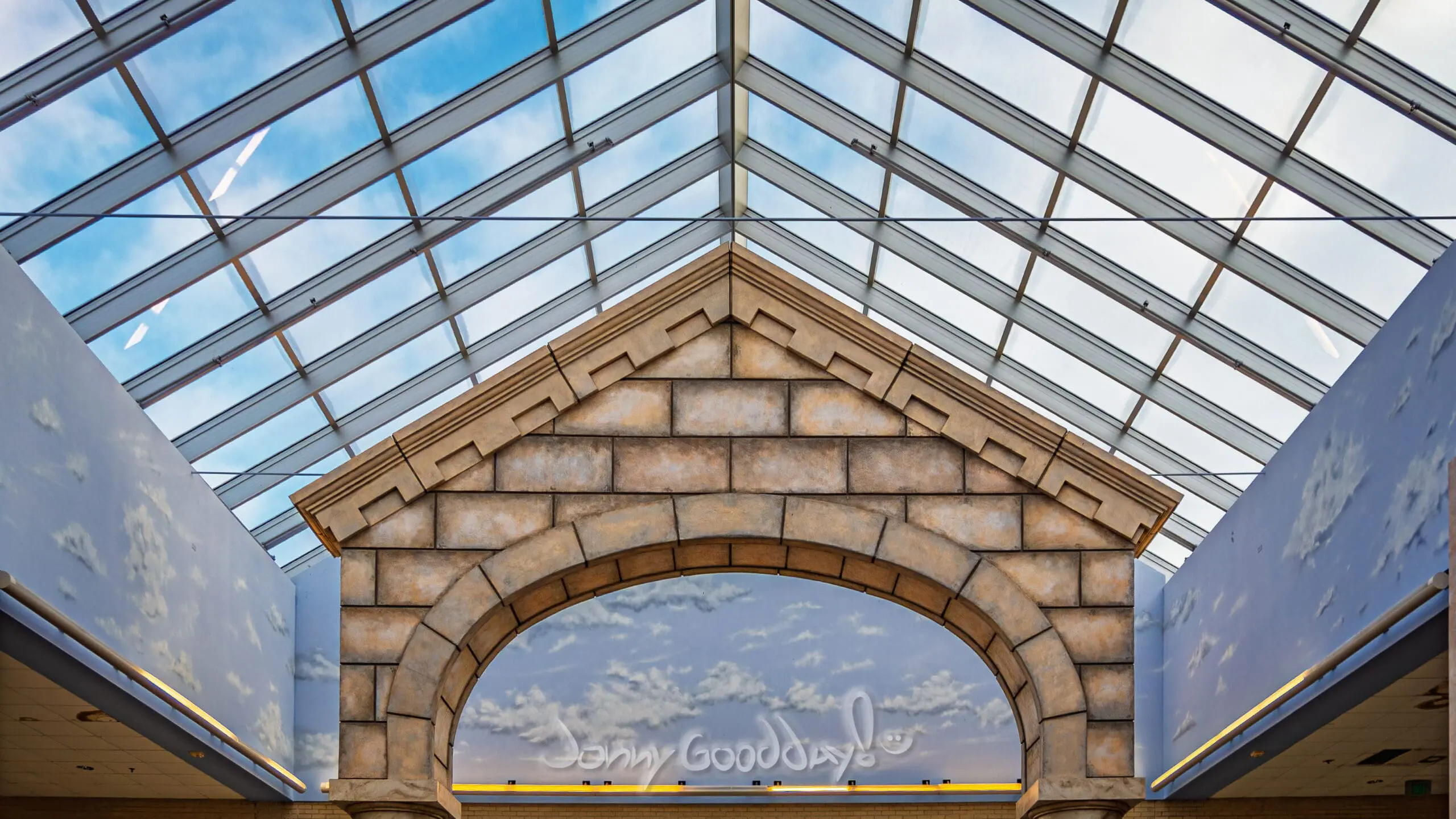 Stone arch beneath the skylight at Ridgmar Mall