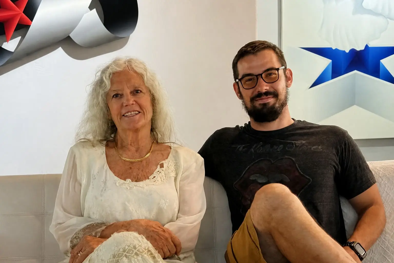 Lorraine Benini and Jonny Goodday seated together inside Museo Benini