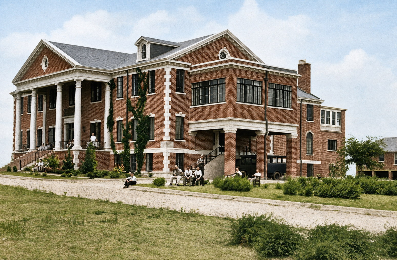Historic view of residents gathered around the Woodmen Circle Home in Sherman