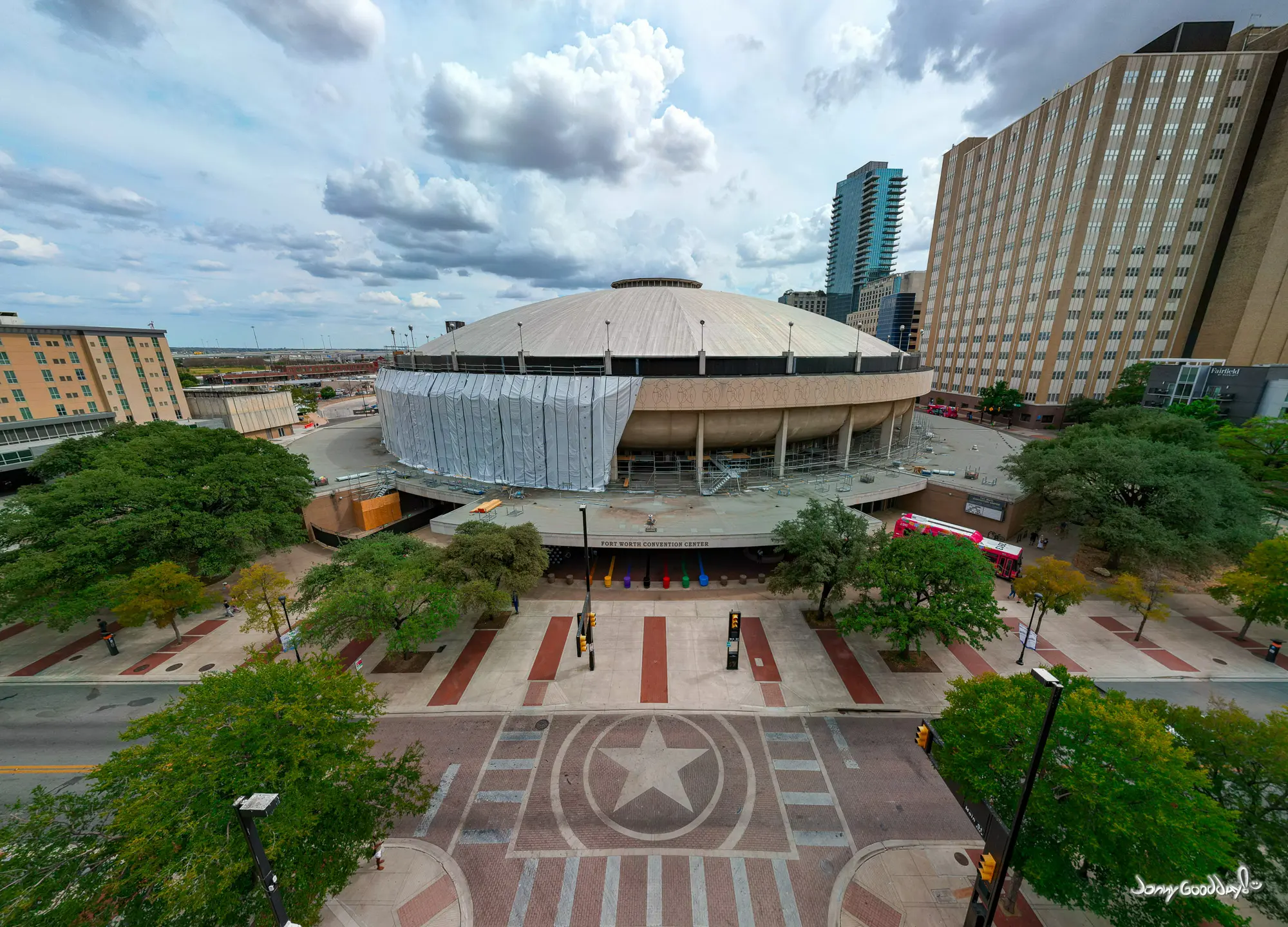 Elevated view of the Fort Worth Convention Center Arena with its round roof and star patterned plaza