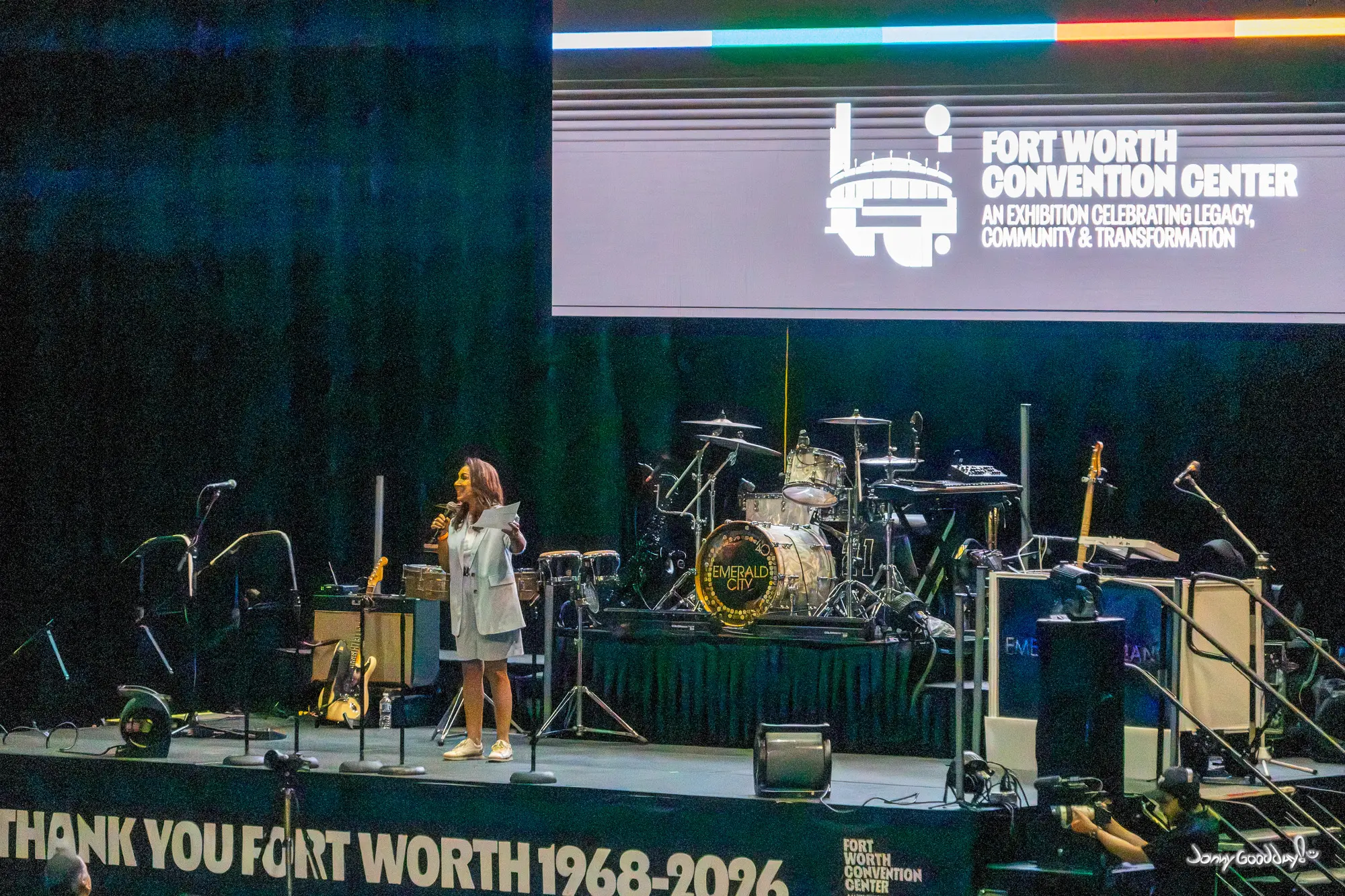 Speaker on the arena farewell stage above a Thank You Fort Worth sign marking 1968 to 2026