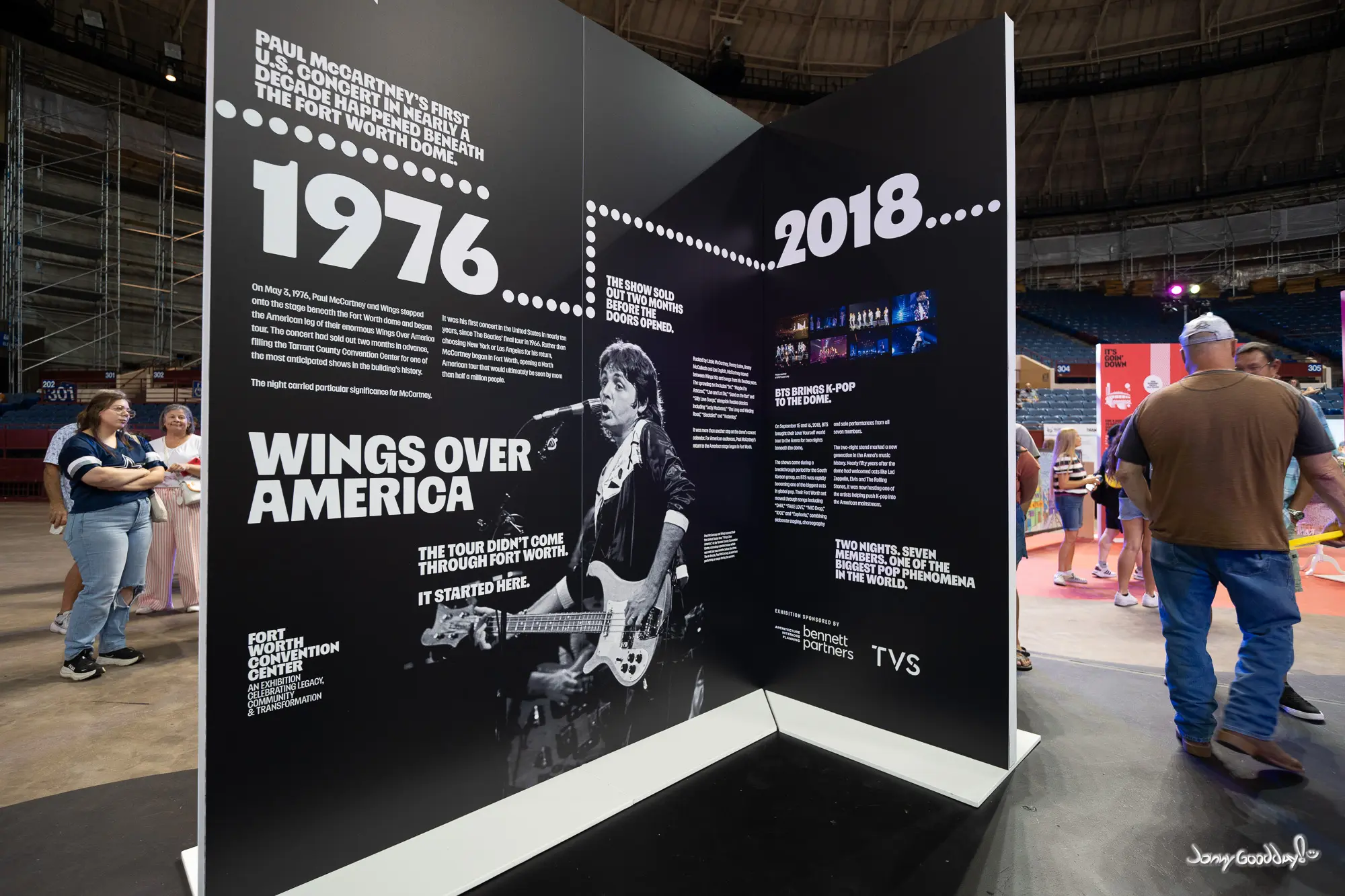 Farewell exhibition panels highlighting Wings in 1976 and BTS in 2018 inside the Fort Worth arena