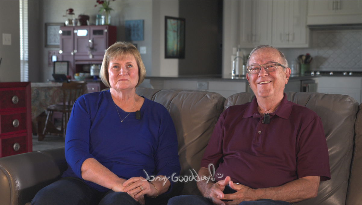 Vicki Zell on the left and Glen Zell on the right, seated in their rebuilt home during the 2026 interview.